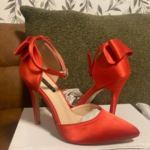 Brand new red Erijunor ankle strap, bow heels